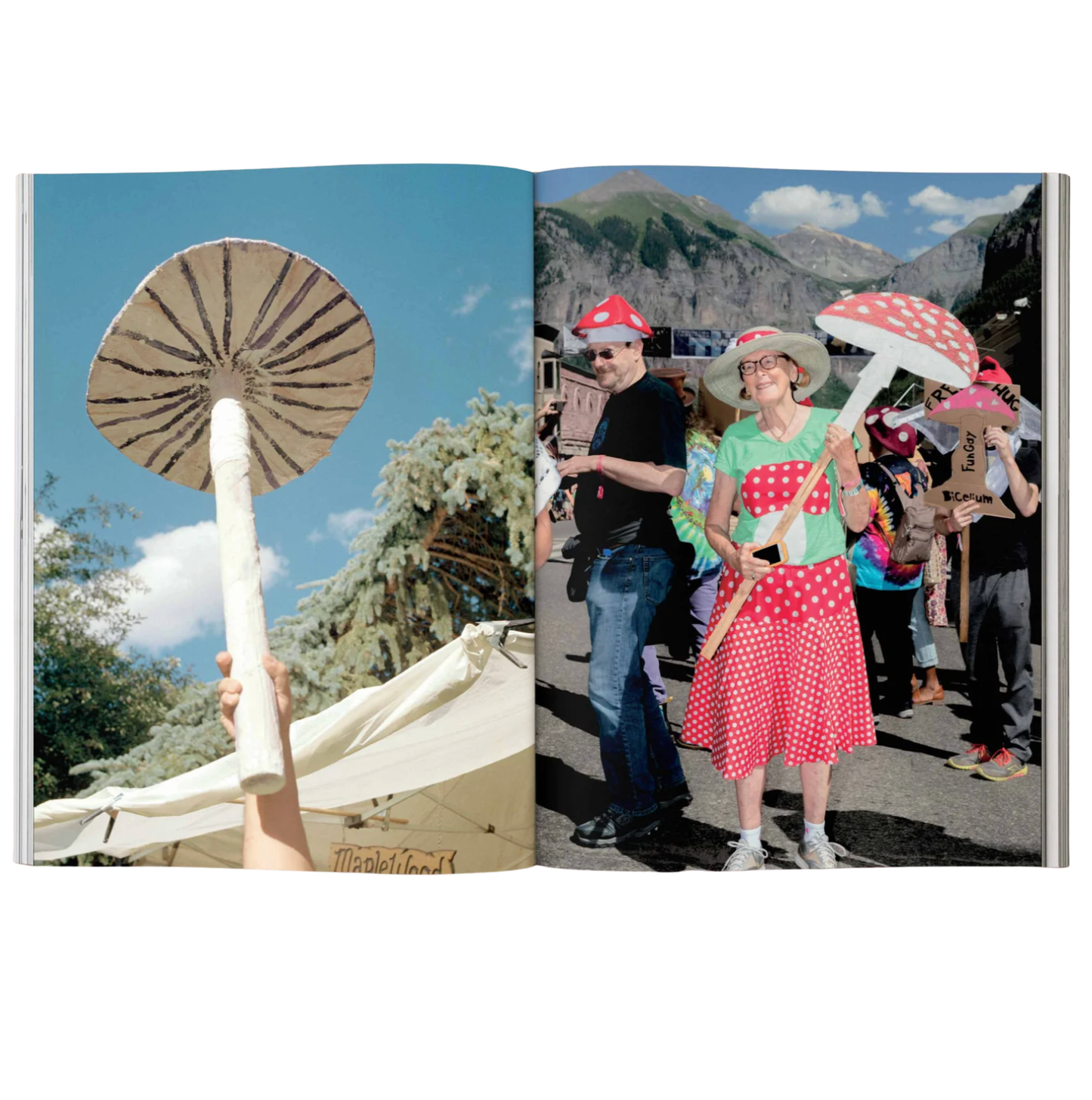 Open book showing two pages with images of people holding large mushroom-shaped umbrellas.